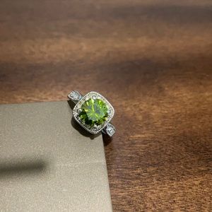 Size 8 ring with green center stone